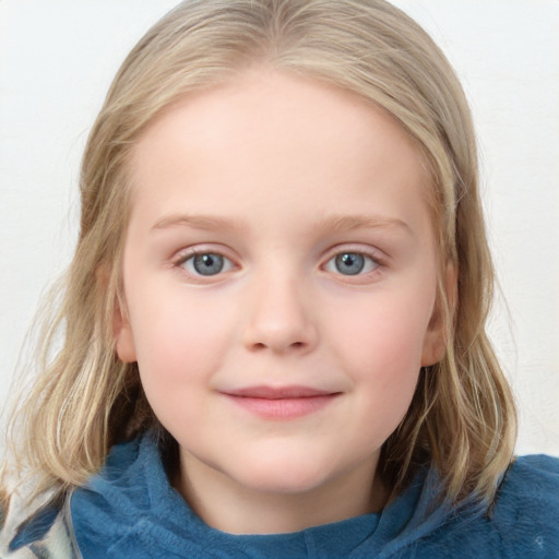 Joyful white child female with medium  brown hair and blue eyes