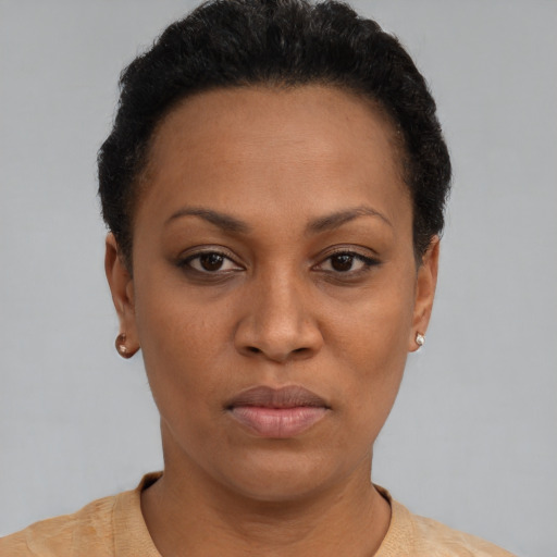 Neutral black adult female with short  black hair and brown eyes