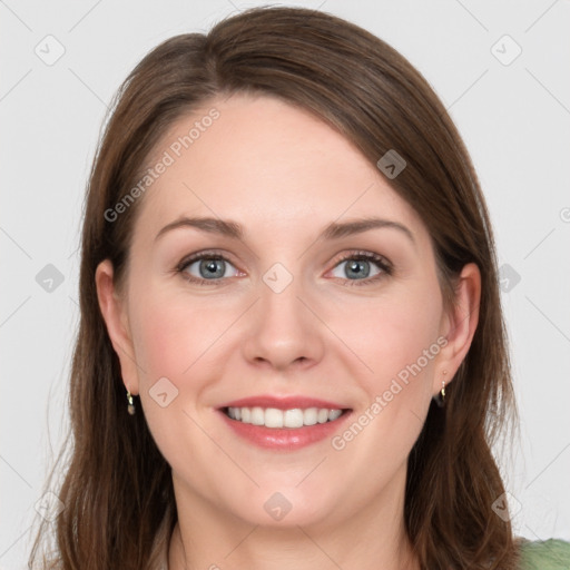 Joyful white young-adult female with long  brown hair and grey eyes