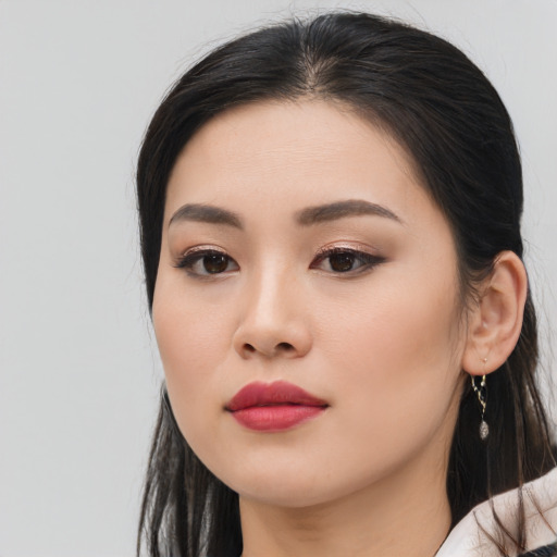 Neutral asian young-adult female with long  black hair and brown eyes