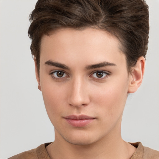 Neutral white young-adult female with short  brown hair and brown eyes