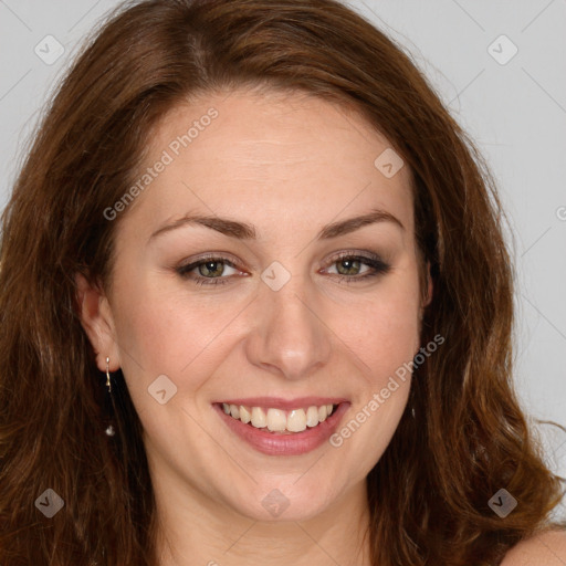 Joyful white young-adult female with long  brown hair and green eyes