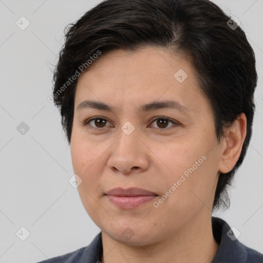 Joyful white adult female with medium  brown hair and brown eyes