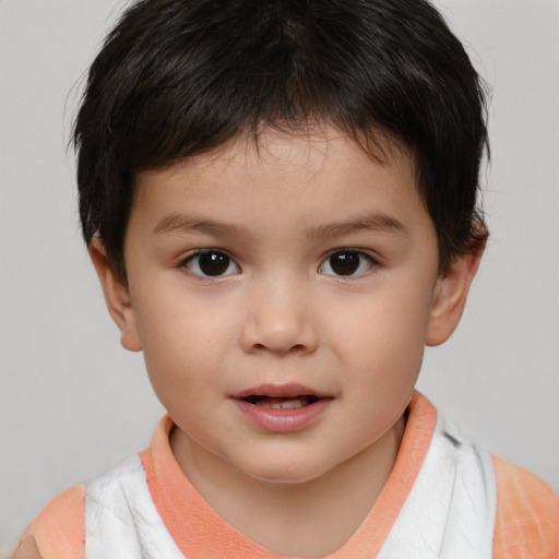 Joyful white child male with short  brown hair and brown eyes