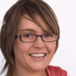 Joyful white young-adult female with medium  brown hair and blue eyes