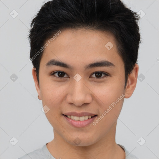 Joyful asian young-adult male with short  brown hair and brown eyes