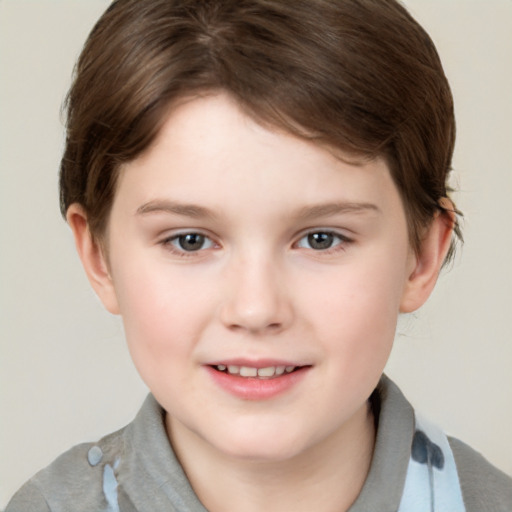 Joyful white child female with short  brown hair and brown eyes