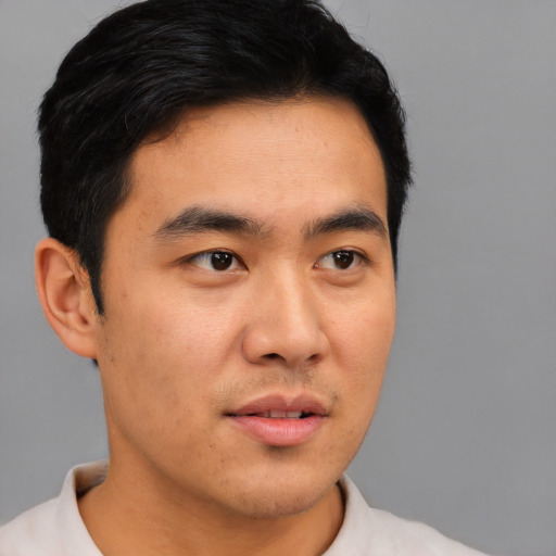 Neutral asian young-adult male with short  black hair and brown eyes