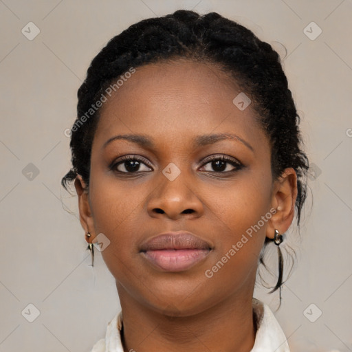 Joyful black young-adult female with medium  black hair and brown eyes