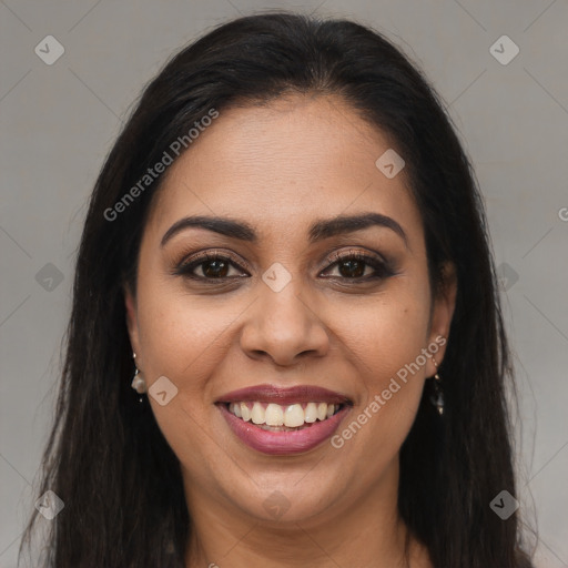 Joyful latino young-adult female with long  brown hair and brown eyes