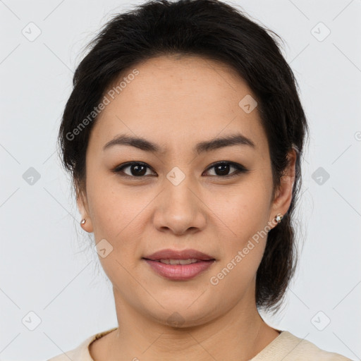 Joyful latino young-adult female with medium  brown hair and brown eyes