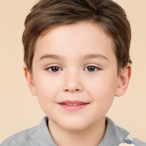 Joyful white child male with short  brown hair and brown eyes