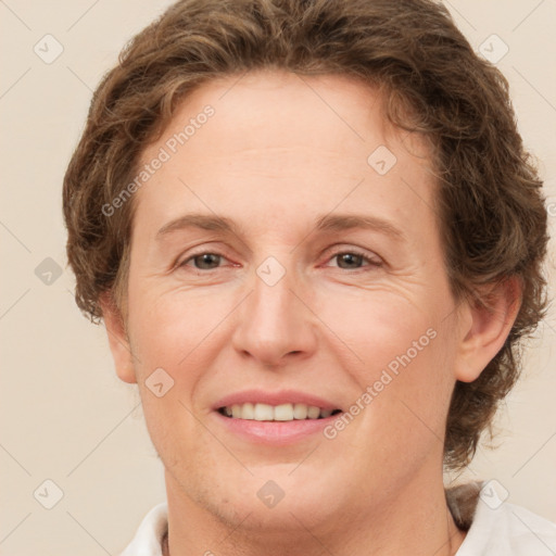 Joyful white adult female with short  brown hair and brown eyes