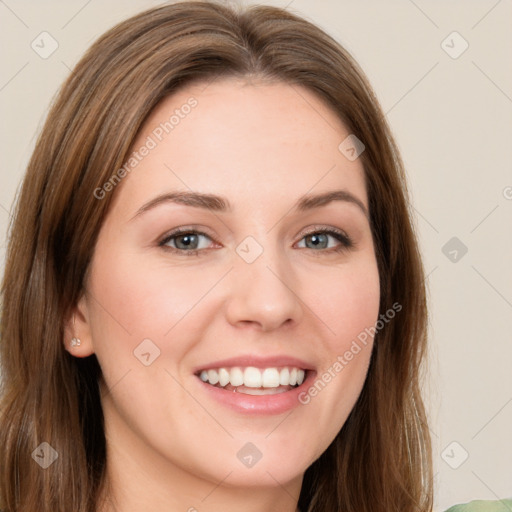 Joyful white young-adult female with long  brown hair and green eyes