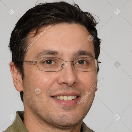 Joyful white adult male with short  brown hair and brown eyes