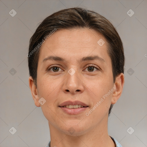 Joyful white adult female with short  brown hair and brown eyes