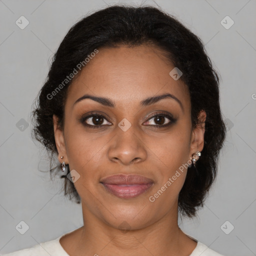 Joyful black young-adult female with medium  brown hair and brown eyes