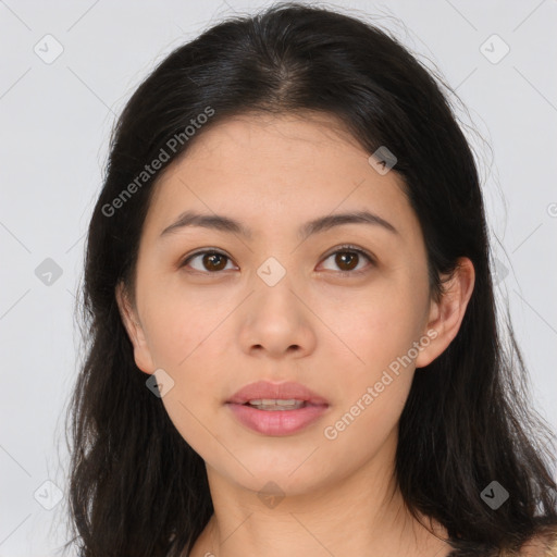 Joyful asian young-adult female with long  brown hair and brown eyes