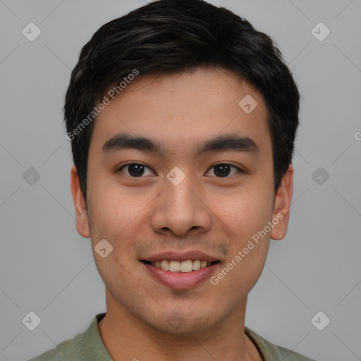 Joyful white young-adult male with short  black hair and brown eyes