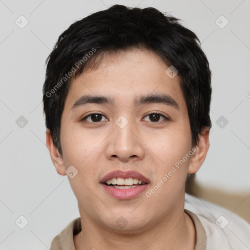 Joyful asian young-adult male with short  black hair and brown eyes
