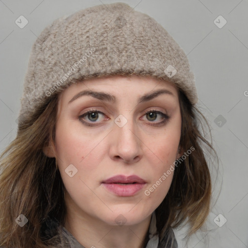 Joyful white young-adult female with medium  brown hair and grey eyes