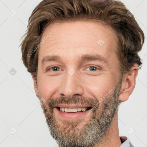 Joyful white adult male with short  brown hair and grey eyes