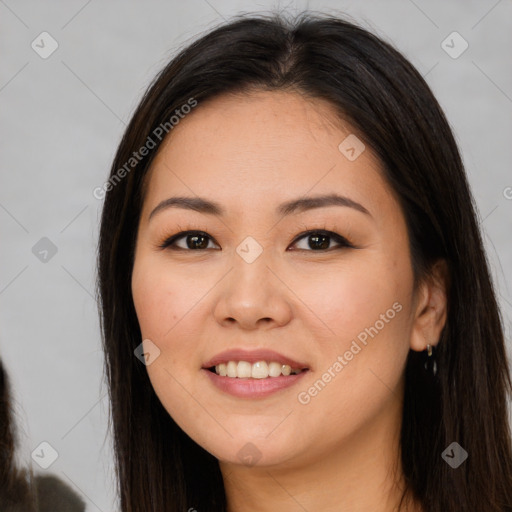 Joyful white young-adult female with long  brown hair and brown eyes