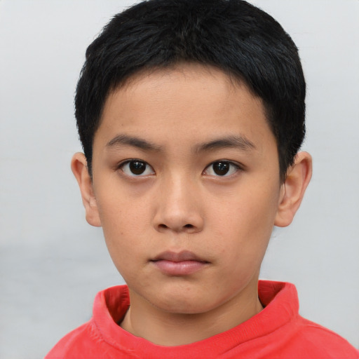 Neutral asian child male with short  black hair and brown eyes