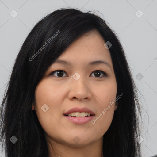 Joyful asian young-adult female with long  black hair and brown eyes