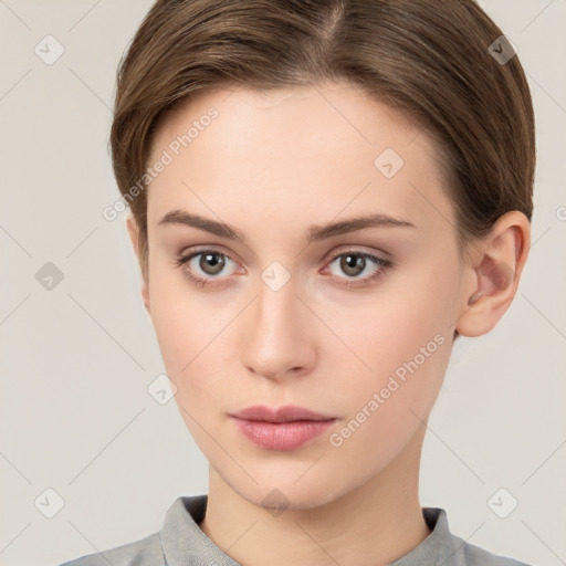 Neutral white young-adult female with short  brown hair and grey eyes