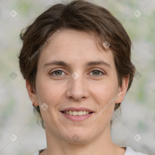 Joyful white young-adult female with medium  brown hair and green eyes