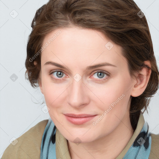 Joyful white young-adult female with medium  brown hair and blue eyes