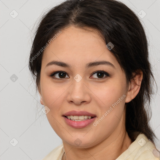 Joyful latino young-adult female with medium  brown hair and brown eyes