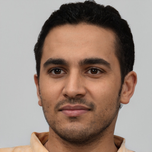 Neutral latino young-adult male with short  black hair and brown eyes