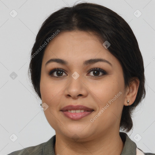 Joyful latino young-adult female with medium  brown hair and brown eyes