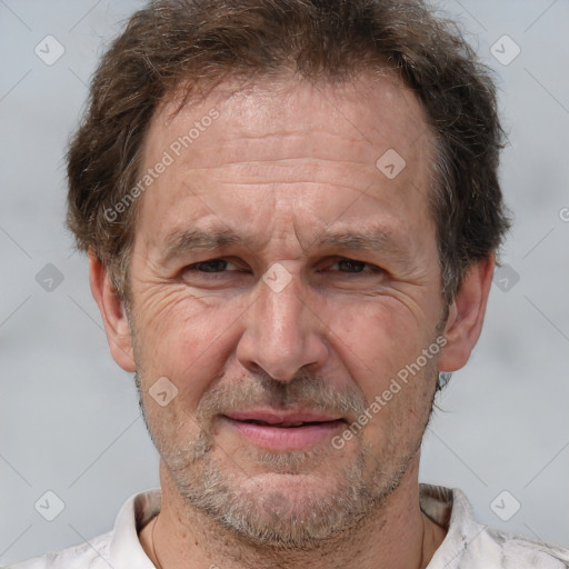 Joyful white middle-aged male with short  brown hair and brown eyes