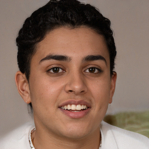 Joyful latino young-adult female with short  brown hair and brown eyes