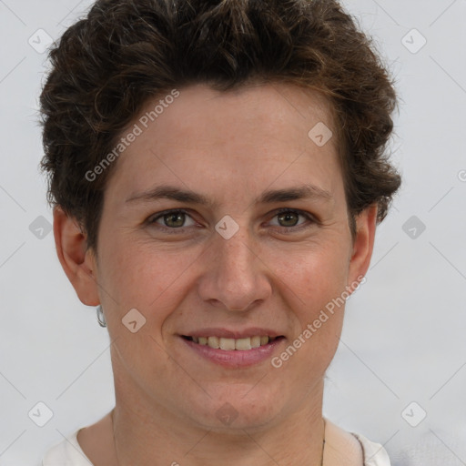 Joyful white adult female with short  brown hair and grey eyes