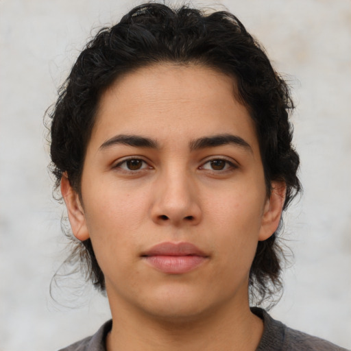 Neutral latino young-adult female with medium  brown hair and brown eyes