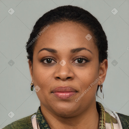 Joyful latino young-adult female with short  black hair and brown eyes