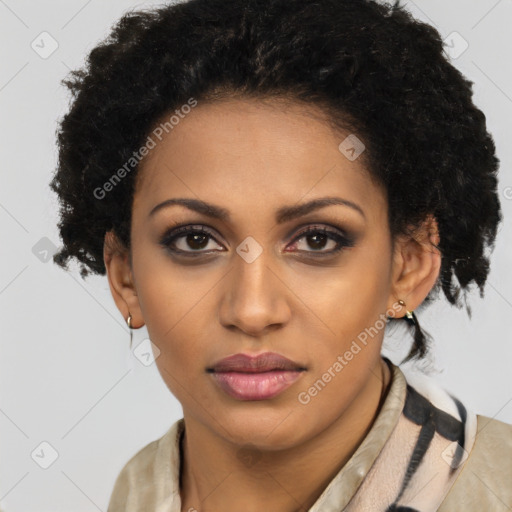 Joyful black young-adult female with long  brown hair and brown eyes