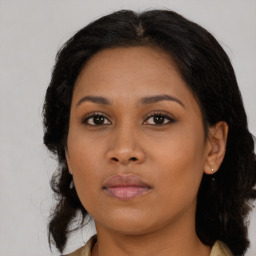 Neutral asian young-adult female with medium  brown hair and brown eyes