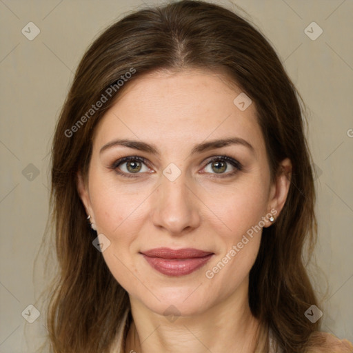 Joyful white young-adult female with long  brown hair and green eyes