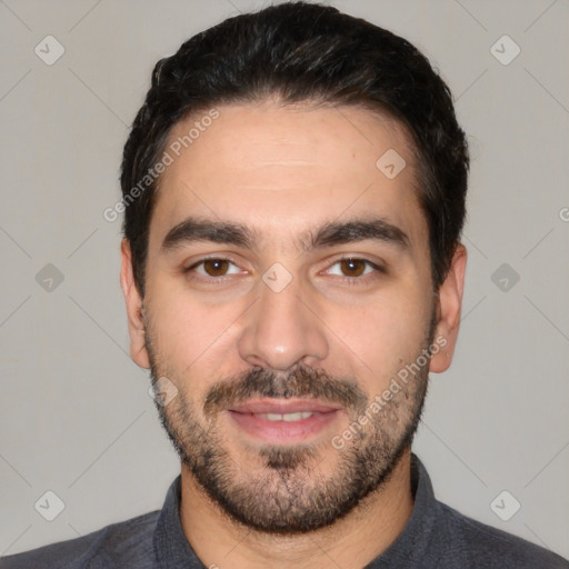 Joyful white young-adult male with short  black hair and brown eyes