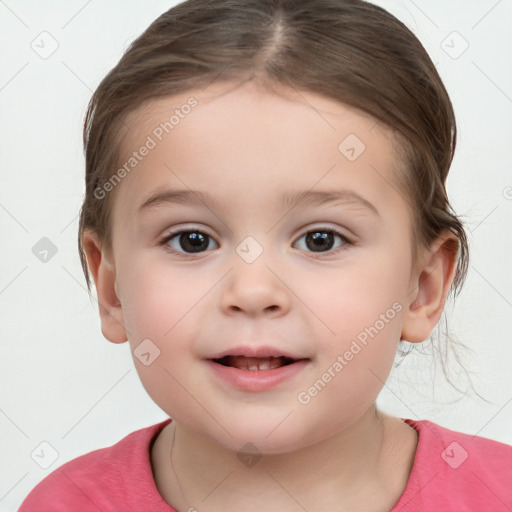 Joyful white child female with short  brown hair and brown eyes