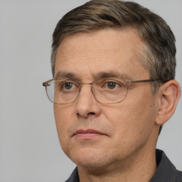 Neutral white middle-aged male with short  brown hair and brown eyes