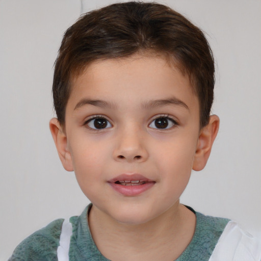 Joyful white child male with short  brown hair and brown eyes