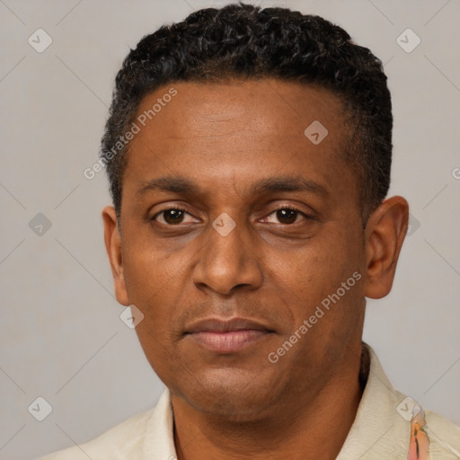 Neutral black adult male with short  black hair and brown eyes