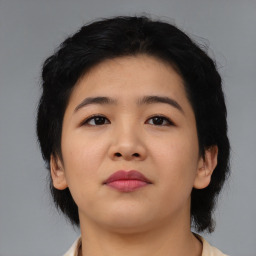 Neutral asian young-adult female with medium  black hair and brown eyes