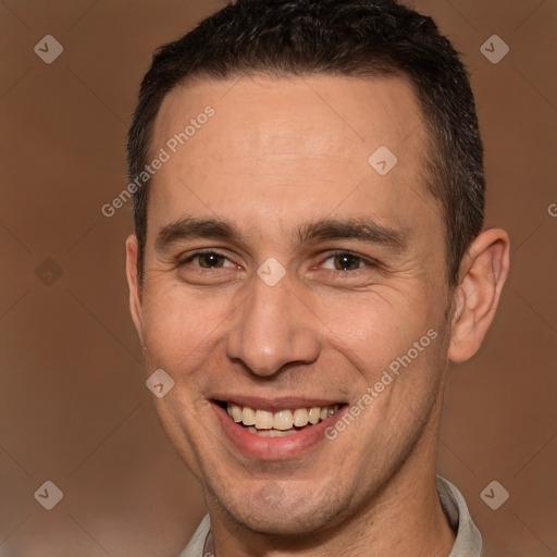 Joyful white adult male with short  brown hair and brown eyes